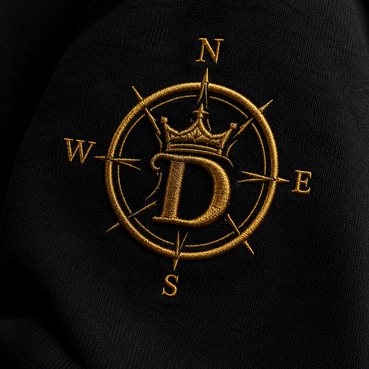 Concept embroidery macro — Internal Command compass, pre-production visualization only